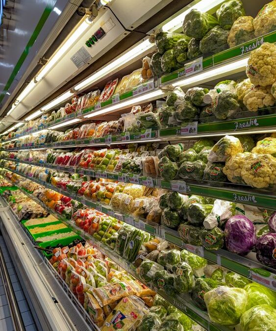 Fresh produce aisle in a grocery store.